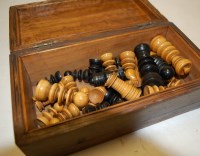 Lot 651 - A set of turned ebony and boxwood chess pieces,...