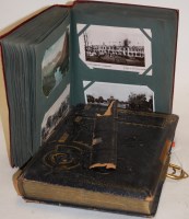 Lot 802 - An early 20th century leather bound postcard...
