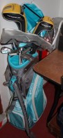 Lot 831 - A collection of assorted golf clubs in bag