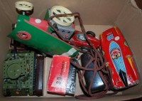 Lot 862 - A box of assorted children toys and games to...