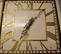Lot 1002 - A painted metal and cut brass wall clock, with...