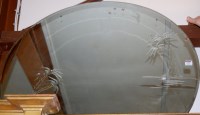 Lot 1008 - A circular bevelled and engraved wall mirror,...
