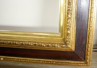 Lot 1019 - A reproduction stained and gilded wood picture...