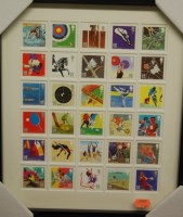 Lot 1067 - A framed display of 30 commemorative stamps...