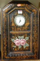 Lot 1073 - A polychrome painted wall clock with quartz...
