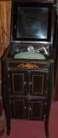 Lot 1109 - An early 20th century ebonised hinge top...
