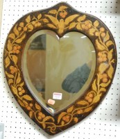 Lot 1132 - A Dutch penwork floral decorated heart shaped...