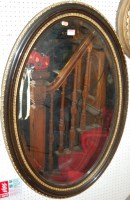 Lot 1111 - A circa 1900 ebonised and gilt gesso framed...