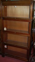 Lot 1163 - A 1930s mahogany four tier stacking bookcase...