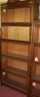 Lot 1164 - A 1930s mahogany five tier stacking bookcase...