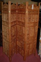 Lot 1169 - A contemporary Indian hardwood carved and...