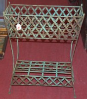 Lot 1181 - A green painted metal two-tier garden plant stand