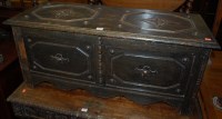 Lot 1182 - An early 20th century moulded oak hinge top...