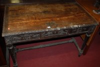 Lot 1183 - A late 19th century low relief carved oak...