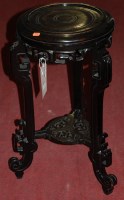 Lot 1211 - A Chinese ebonised circular low plant-stand,...