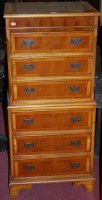Lot 1212 - A reproduction yew wood six-drawer tallboy of...
