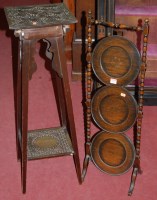 Lot 1234 - A 1930s moulded oak circular three-tier...