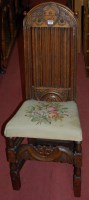Lot 1235 - An antique joined and low relief carved oak...