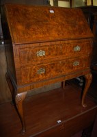 Lot 1245 - A 1930s figured walnut, feather-banded and...