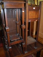 Lot 1247 - An Edwardian walnut square section two-tier...