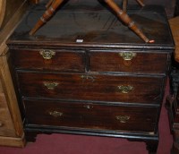 Lot 1253 - An 18th century oak squarefront chest of two...