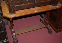 Lot 1256 - A Victorian Gothic revival oak hall table...
