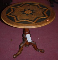 Lot 1268 - A Victorian walnut and specimen wood inlaid...
