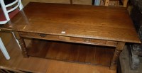 Lot 1270 - A contemporary joined oak coffee table, having...