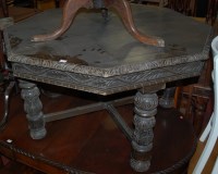 Lot 1274 - A circa 1900 heavily carved oak octagonal...