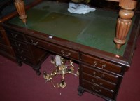 Lot 1281 - An early 20th century walnut and green leather...