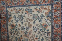 Lot 1146 - A Persian style machine woven cream ground...