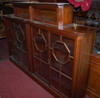 Lot 1289 - A large Edwardian walnut four door glazed...