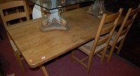 Lot 1296 - A contemporary light oak round cornered dining...
