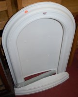 Lot 1297 - A white painted plaster open shelf in the form...