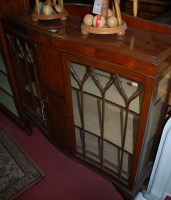 Lot 1299 - A 1930s walnut ledgeback serpentine fronted...