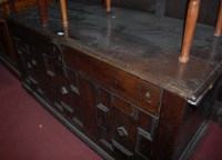 Lot 1305 - An 18th century provincial oak hinge top three...