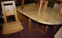 Lot 1314 - A modern pine dropleaf kitchen table; together...