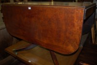 Lot 1317 - A Regency mahogany round cornered dropleaf...