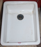 Lot 1138 - An early 20th century white glazed shallow...