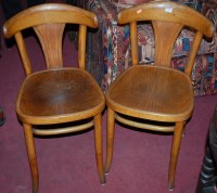 Lot 1334 - A set of four beech bentwood splatback panel...