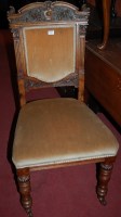 Lot 1343 - A set of six late Victorian carved oak dining...