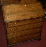 Lot 1354 - An early 19th century oak and mahogany...
