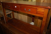 Lot 1359 - A contemporary Eastern hardwood two drawer and...