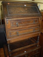 Lot 1364 - An early 20th century moulded and beaded oak...