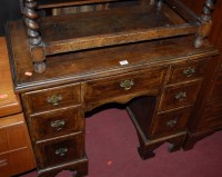 Lot 1365 - An early Georgian style figured walnut,...