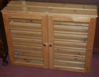 Lot 1372 - A pair of modern pine double door glazed...