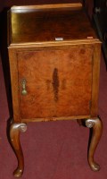 Lot 1385 - A 1930s figured walnut single door bedside...