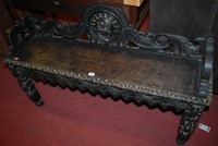 Lot 1399 - A late 19th century carved and ebonised oak...