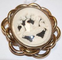 Lot 487 - A Victorian pinchbeck and carved ivory brooch,...