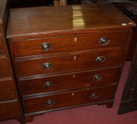 Lot 1175 - An early 19th century oak squarefront chest of...